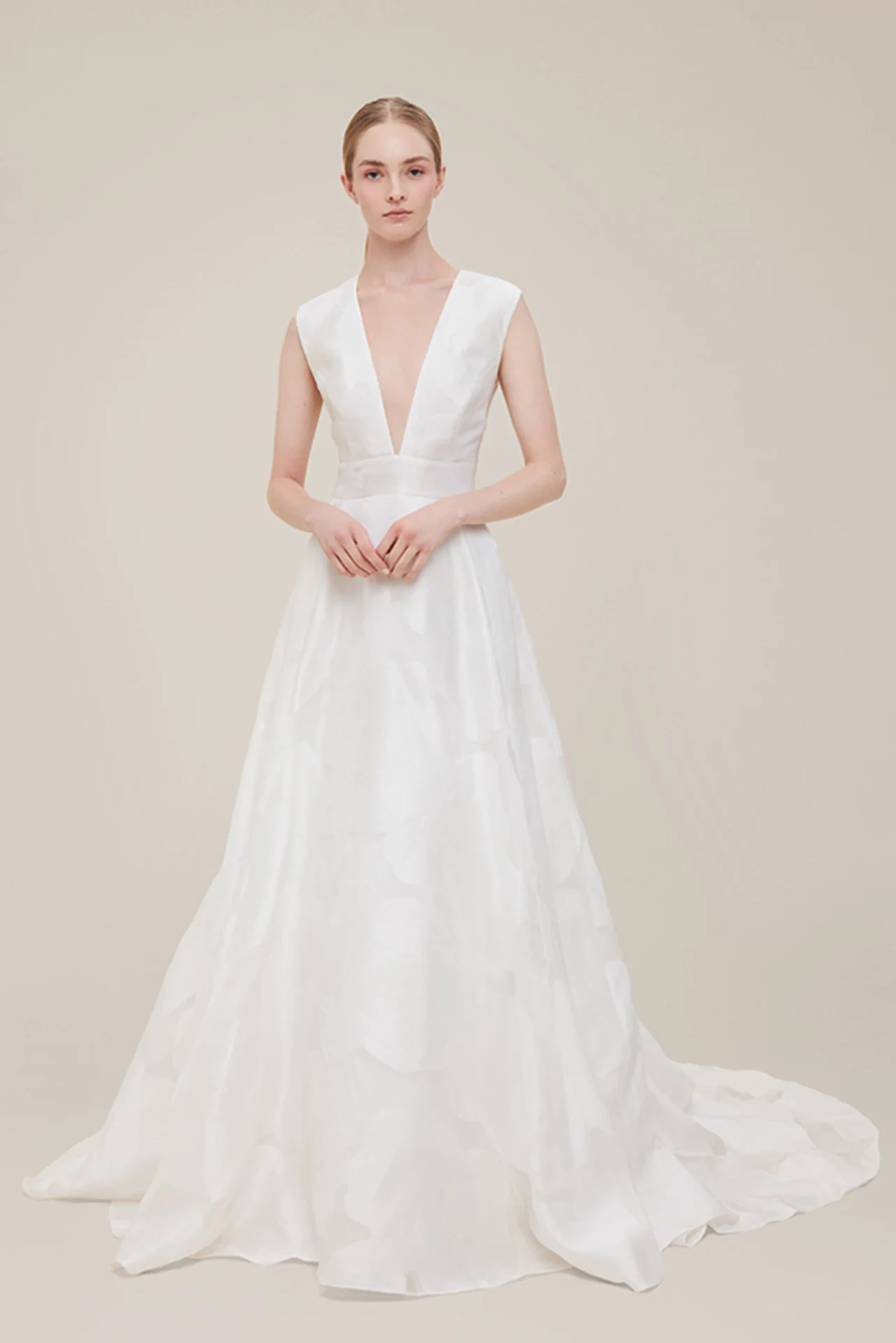 V-neck bridal gown with a long train