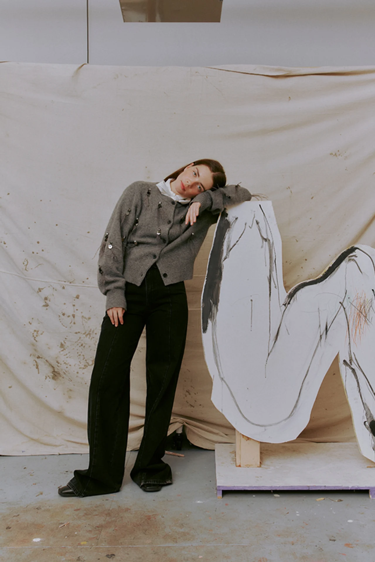 Fashion portrait beside an illustrated figure