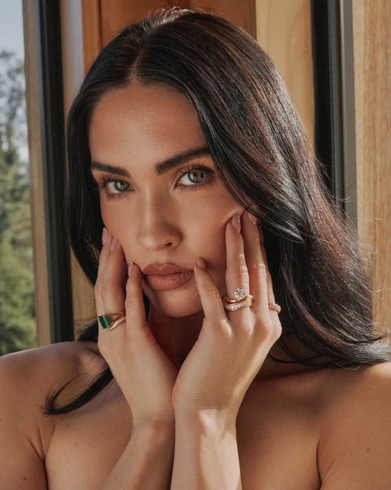 Beauty portrait showing rings, skin texture and soft window light